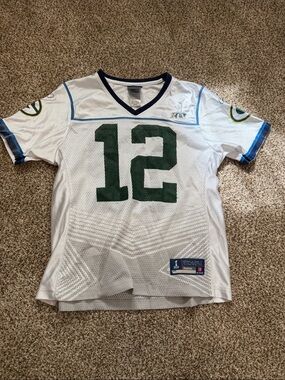 Reebok White womens Football Jersey with Green Number 12 and Blue Trim